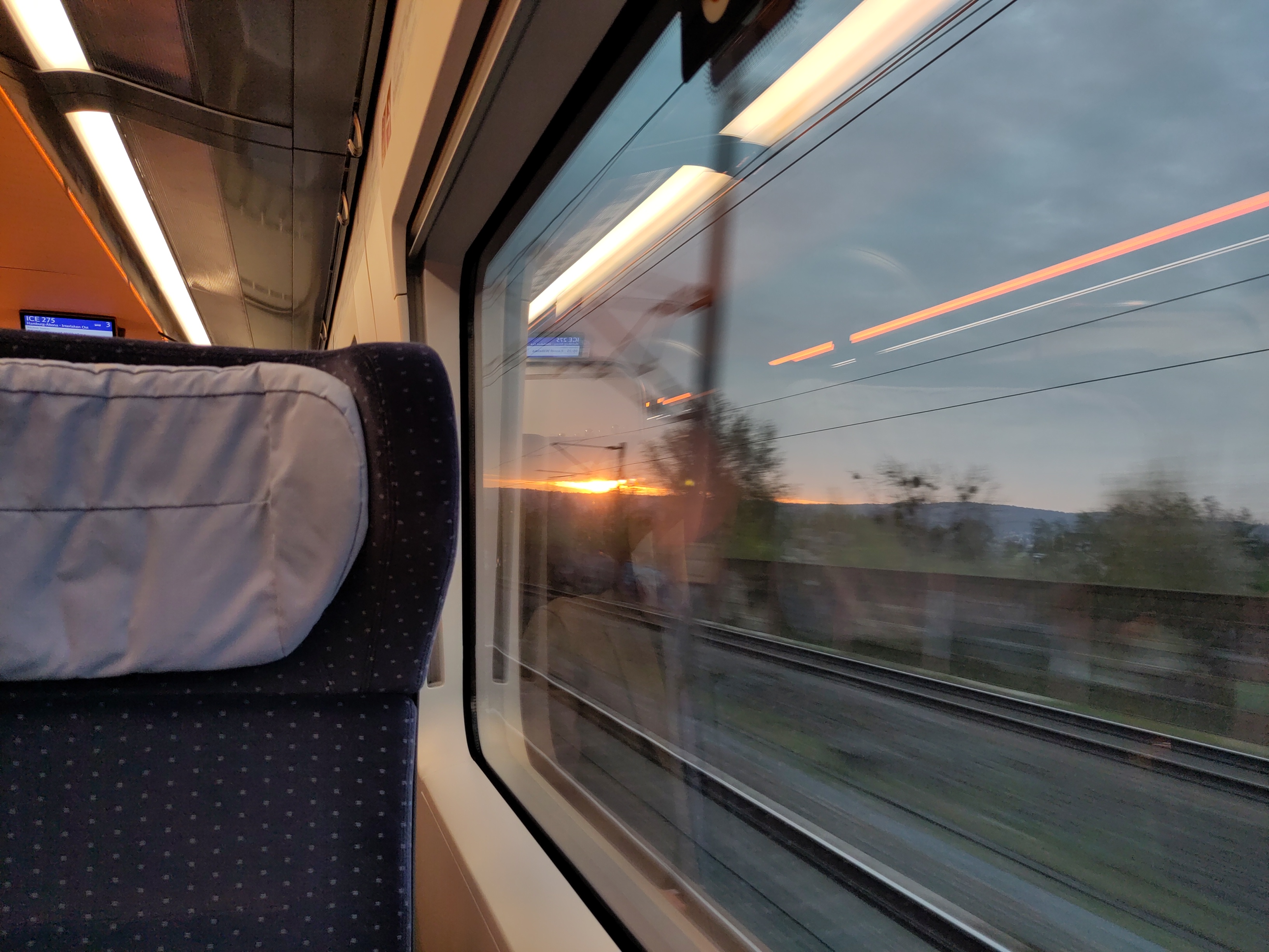 Sunset view from a (Deutsche Bahn) train seat.